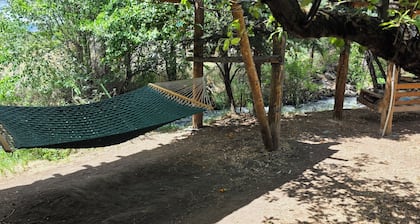 Where the Creek Giggles and the Pillows Hug Back. King Bed with Full Kitchen.