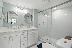 Shower, hair dryer, towels, soap