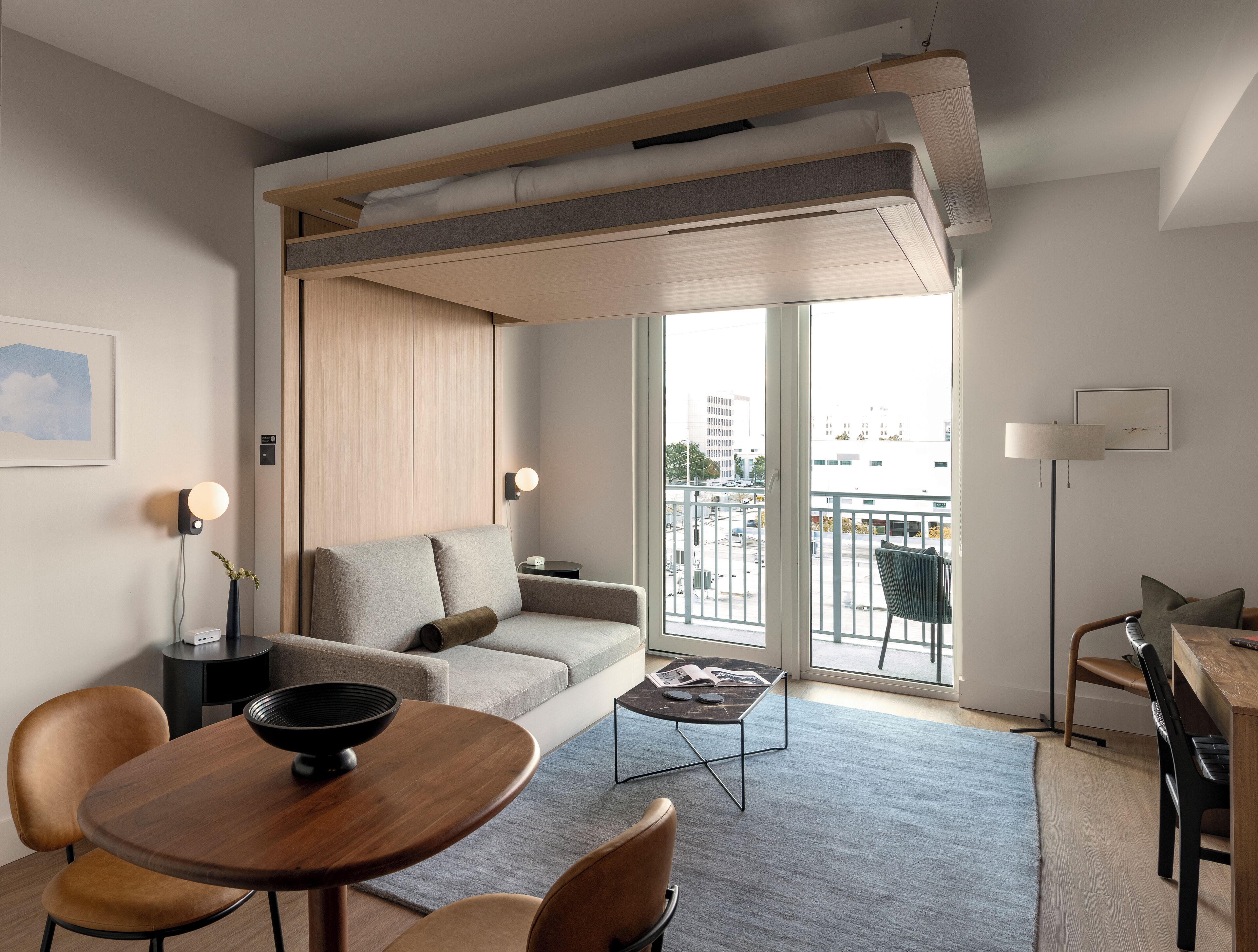 Studio Suite with Balcony | Living area | 55-inch Smart TV with digital channels