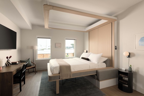 Espacio para trabajar con laptop, wifi gratis y ropa de cama