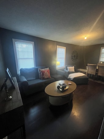 Living area. Charming 2-bedroom upstairs apartment in Durham