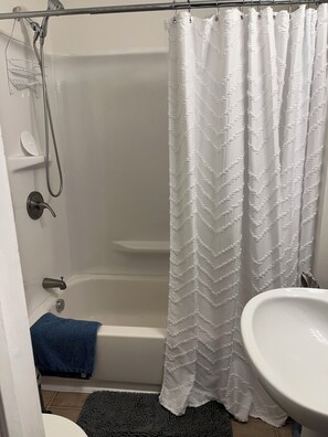 Hair dryer, towels, soap, toilet paper