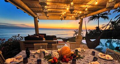 Artist Cliffside Home with private beach access and cabana and two cats.