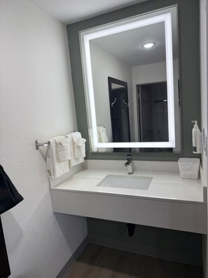 Hair dryer, towels, soap, shampoo