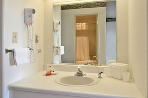 Hair dryer, towels, soap, shampoo
