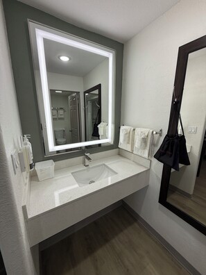 Hair dryer, towels, soap, shampoo