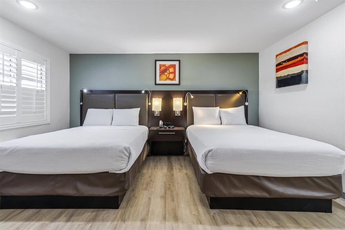 Desk, laptop workspace, free WiFi, bed sheets