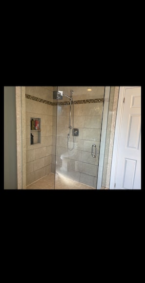 Shower, towels, soap, toilet paper