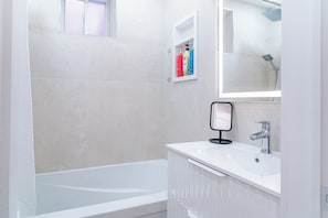 Hair dryer, towels, soap, toilet paper