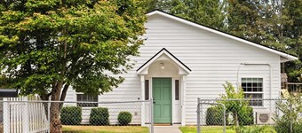 This cottage offers a spacious layout ideal for relaxing or working remotely.