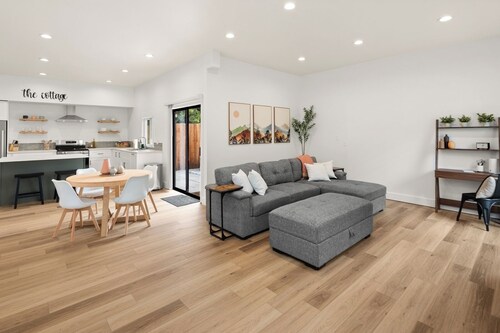 This cottage offers a spacious layout ideal for relaxing or working remotely.