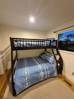 4 bedrooms, desk, iron/ironing board, travel cot