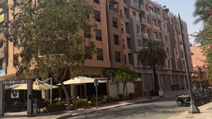 A multi-story hotel with a modern design, featuring balconies, large windows, and outdoor seating areas. - Beautiful 2-bedroom apartment in the heart of Gueliz (Marrakech)