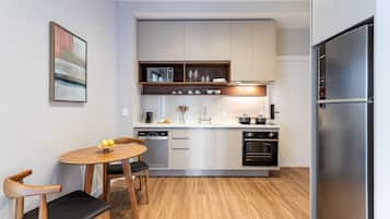 Exclusive Apartment | Private kitchen | Full-sized fridge, microwave, stovetop, coffee/tea maker