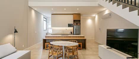 Exclusive Duplex, 1 Queen Bed | Living area | 42-inch Smart TV with digital channels