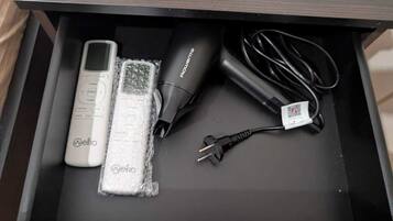 Hair dryer, towels, soap, toilet paper