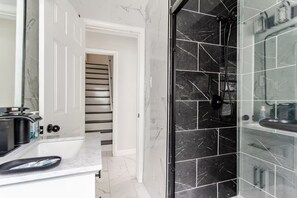 Hair dryer, towels, soap, shampoo