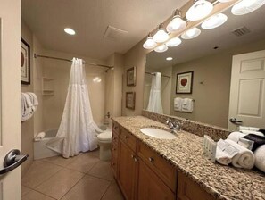 Hair dryer, towels, soap, shampoo