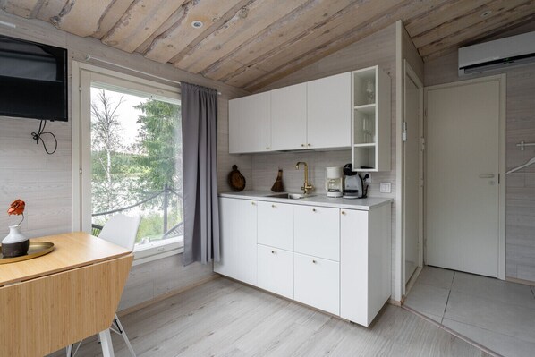 Microwave, coffee/tea maker, cookware/dishes/utensils, dining tables - Private Lakeside Suite with Sauna (Himos)