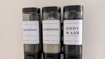 Hair dryer, towels, soap, toilet paper