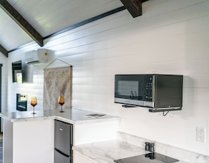 Microwave, stovetop, coffee/tea maker, toaster