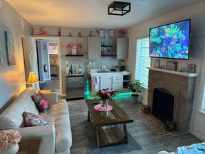 Smart TV, books - A Christmas Key West Flamingo Bungalow has arrived in Fort Lauderdale. (Fort Lauderdale)