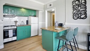 Coffee/tea maker, fridge, microwave, oven