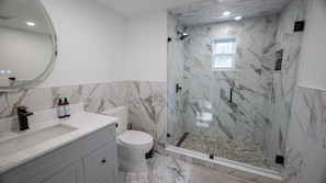 Shower, hair dryer, towels, soap