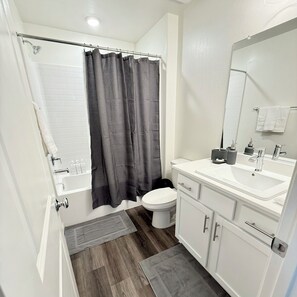 Hair dryer, towels, soap, shampoo