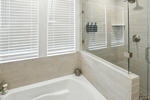 Shower, hair dryer, towels, shampoo