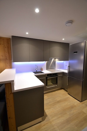 Fridge, microwave, dishwasher, coffee/tea maker