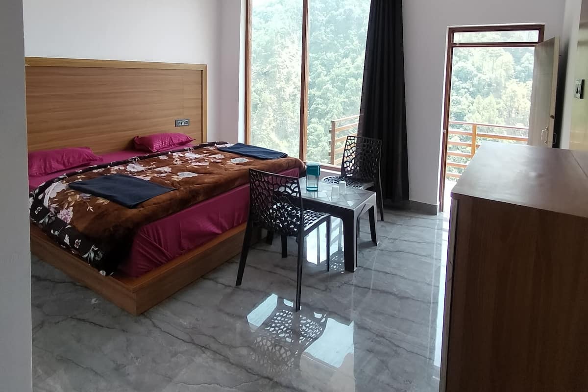 Deluxe Double Room, Balcony, River View | In-room safe, desk, laptop workspace, blackout curtains
