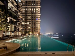 Pool - Seaside Bliss Chic 1BR with Balcony, Pool & Gym (Dubai)