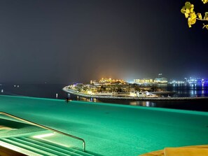 Pool - Seaside Bliss Chic 1BR with Balcony, Pool & Gym (Dubai)
