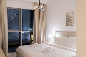 1 bedroom, iron/ironing board, WiFi, bed sheets - Seaside Bliss Chic 1BR with Balcony, Pool & Gym (Dubai)