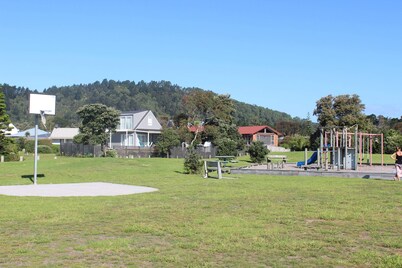 5 minutes walk to beautiful beach & shops, fully fenced section pet friendly.