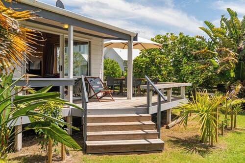 5 minutes walk to beautiful beach & shops, fully fenced section pet friendly.