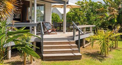 5 minutes walk to beautiful beach & shops, fully fenced section pet friendly.