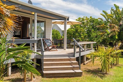 5 minutes walk to beautiful beach & shops, fully fenced section pet friendly.