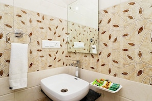 Hair dryer, slippers, towels, soap