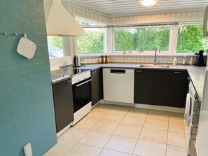 Fridge, microwave, dishwasher, cookware/dishes/utensils