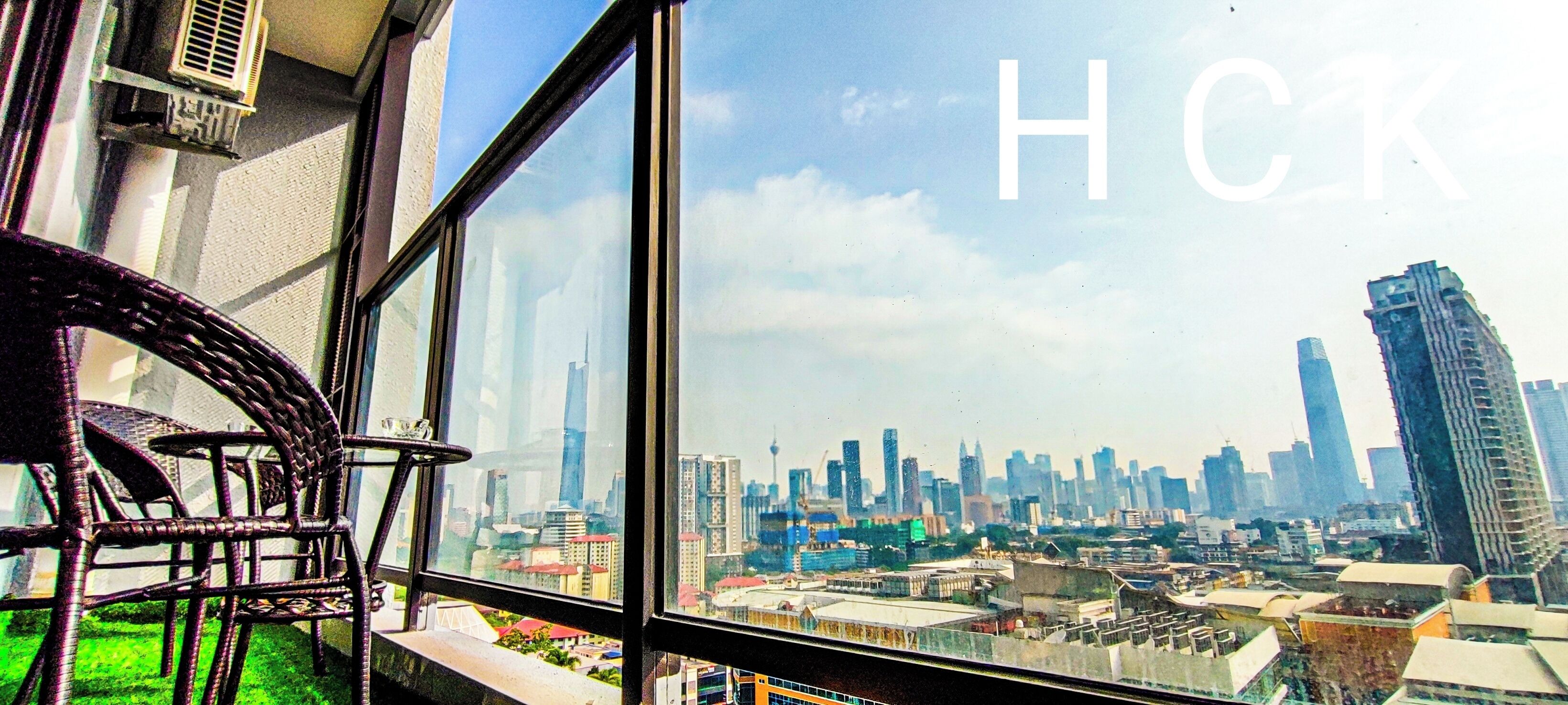 Deluxe Suite, Balcony, City View | Iron/ironing board, free WiFi