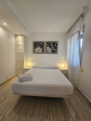 Apartament | 2 dormitoris i planxa i posts de planxar 