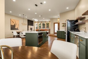 Coffee/tea maker, fridge, microwave, oven