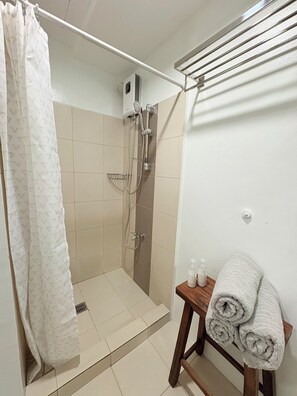 Shower, bidet, towels, soap