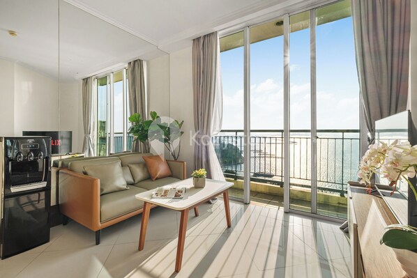 Apartment, 1 Bedroom, Sea View | Living area | 43-inch Smart TV with cable channels, Netflix, streaming services