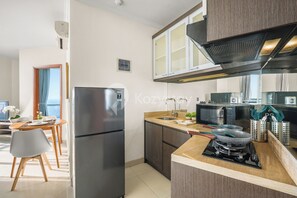 Apartment, 1 Bedroom, Sea View | Private kitchen | Full-sized fridge, microwave, stovetop, rice cooker - Mirava by Kozystay - Ancol (Jakarta)