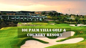 A golf course with bunkers and a building in the background. - ioic (Kulai)