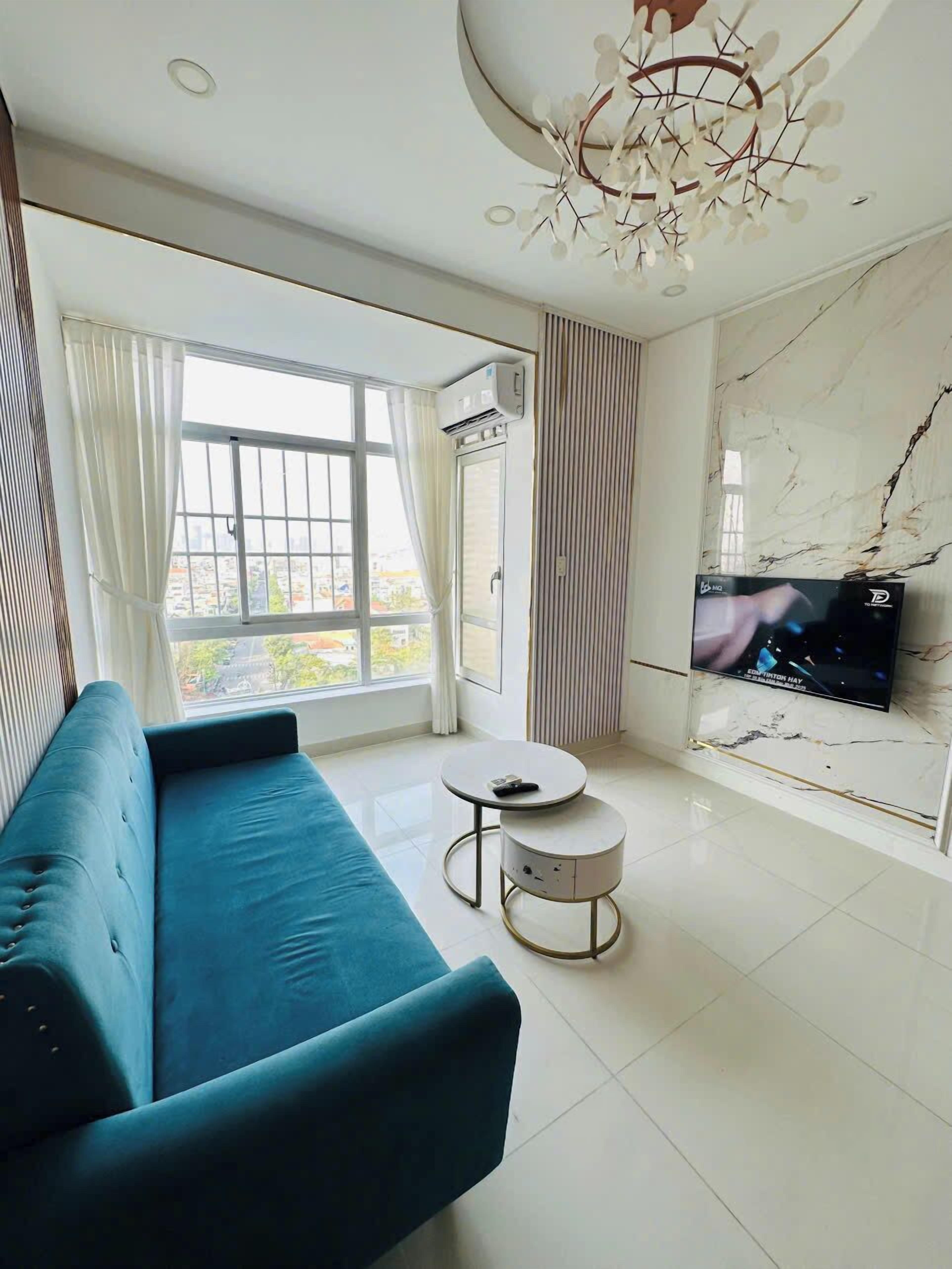 Deluxe Apartment | Living area | Fireplace, heated floors