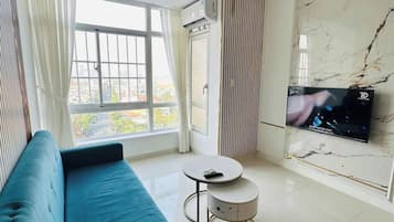 Căn hộ Deluxe | Khu phòng khách | Lò sưởi, sàn nhà có sưởi